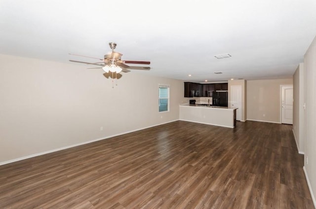 724 Autumnwood Way, Princeton, TX 75407 - unfurnished living room featuring dark wood-style floors, a ceiling fan, and recessed lighting