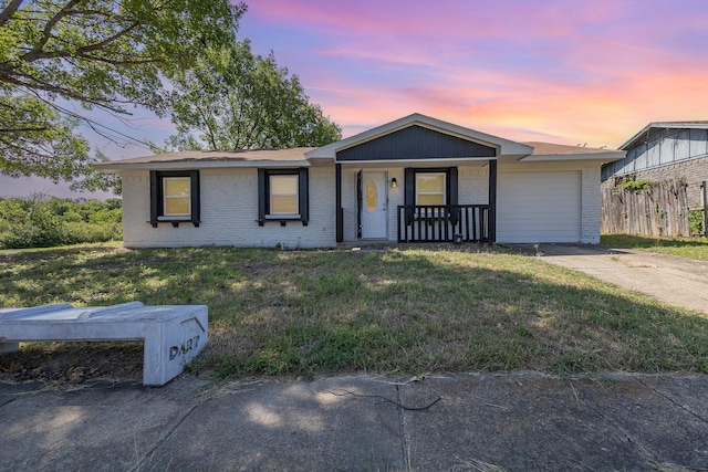 3828 Pacesetter Dr, Dallas, TX 75241 - ranch-style home with brick siding, covered porch, and a yard