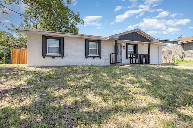 3828 Pacesetter Dr, Dallas, TX 75241 - ranch-style home with a garage, a porch, and brick siding