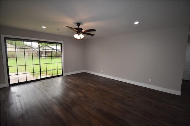 4918 Stagecoach Ln, Garland, TX 75043 - empty room with dark wood-style flooring, ceiling fan, and recessed lighting