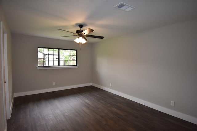 4918 Stagecoach Ln, Garland, TX 75043 - unfurnished room with dark wood-style floors and a ceiling fan