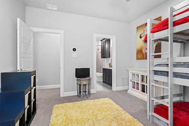 1833 Rolling Heights Ln, Fort Worth, TX 76008 - carpeted bedroom with baseboards and connected bathroom