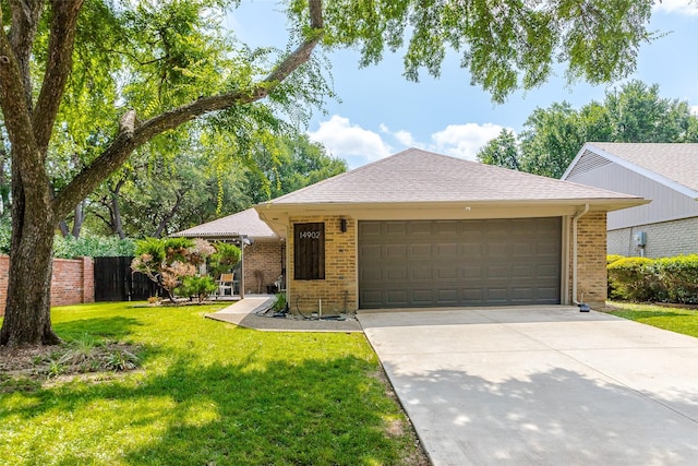 14902 Le Grande Dr, Addison, TX 75001 - ranch-style home featuring brick siding, concrete driveway, an attached garage, and roof with shingles