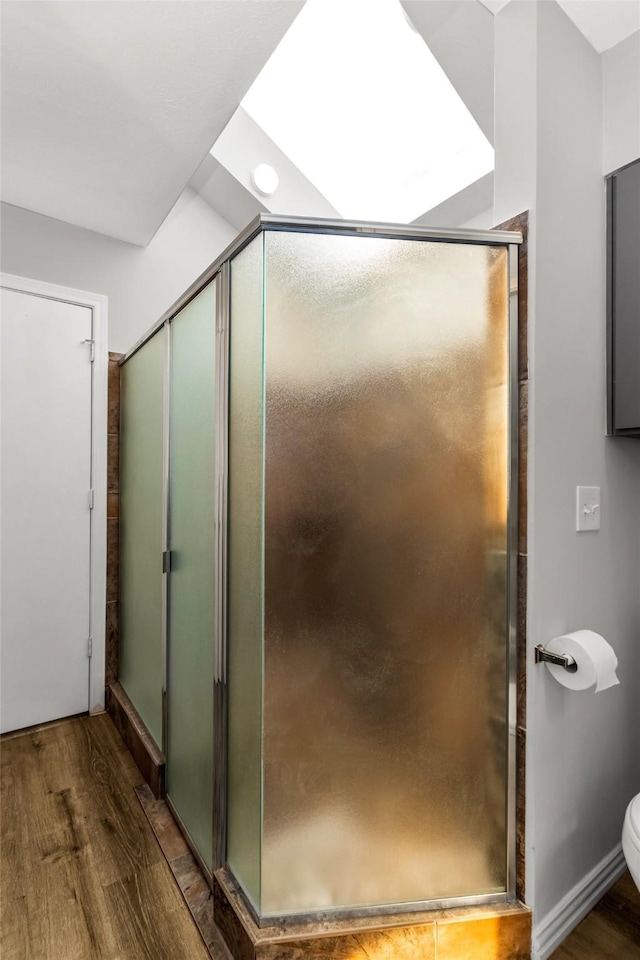 14902 Le Grande Dr, Addison, TX 75001 - full bathroom with wood finished floors and a stall shower
