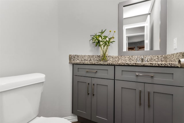 14902 Le Grande Dr, Addison, TX 75001 - bathroom featuring toilet and vanity