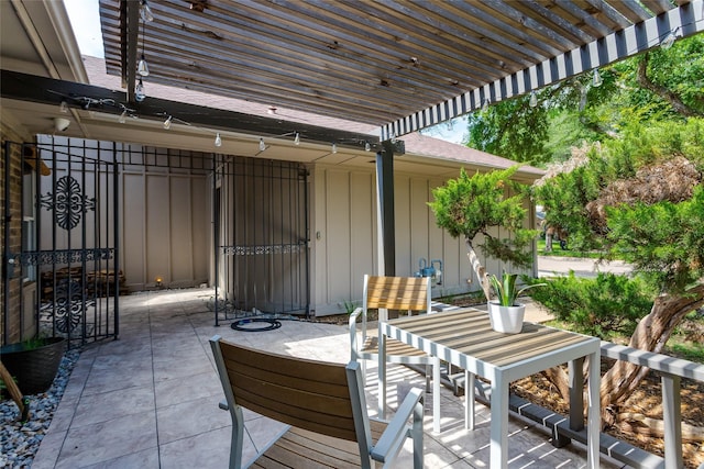 14902 Le Grande Dr, Addison, TX 75001 - view of patio / terrace with a pergola and outdoor dining space