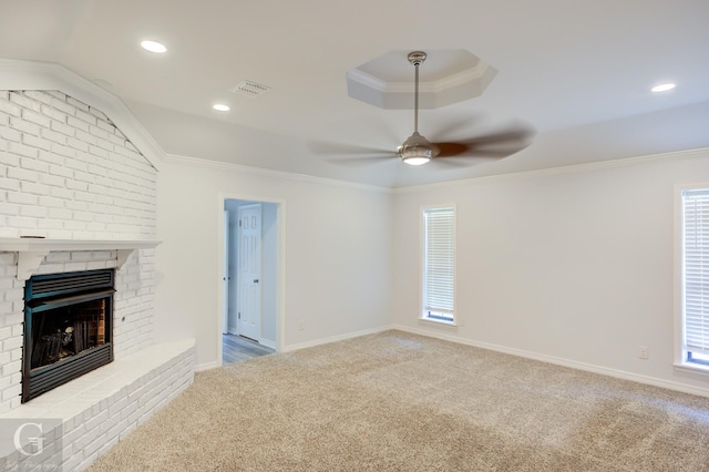 163 Sistrunk Ln, Bossier City, LA 71112 - unfurnished living room featuring carpet, a ceiling fan, a brick fireplace, ornamental molding, and recessed lighting