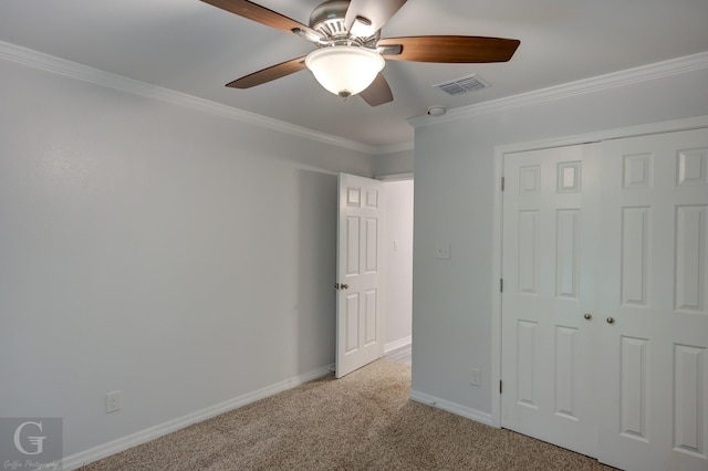 163 Sistrunk Ln, Bossier City, LA 71112 - unfurnished bedroom with light colored carpet, crown molding, a closet, and ceiling fan