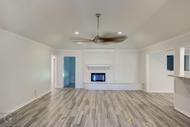 163 Sistrunk Ln, Bossier City, LA 71112 - unfurnished living room featuring ceiling fan, light wood-style flooring, ornamental molding, recessed lighting, and a brick fireplace