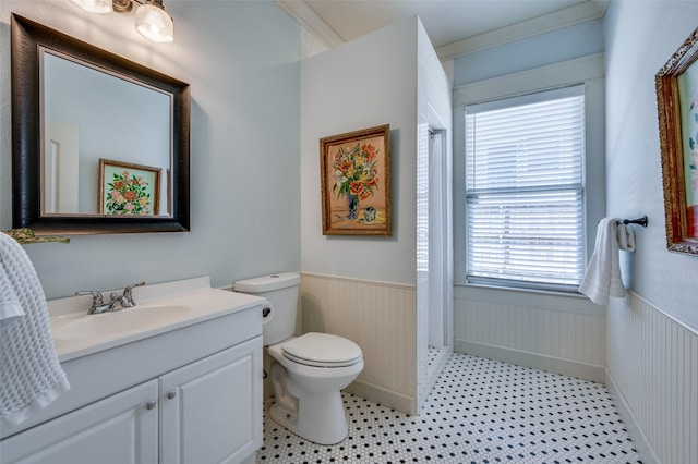 5818 Worth St, Dallas, TX 75214 - bathroom with a wainscoted wall, vanity, and curtained shower