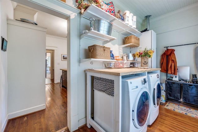 5818 Worth St, Dallas, TX 75214 - washroom with independent washer and dryer, crown molding, and wood finished floors