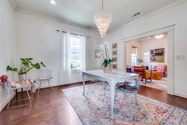 5818 Worth St, Dallas, TX 75214 - dining area with ornamental molding, wood finished floors, a chandelier, and recessed lighting