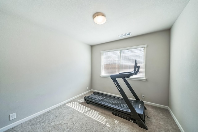 2806 Ocean Dr, Lancaster, TX 75146 - workout room with carpet floors and baseboards