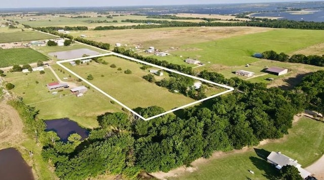 1170 County Road 34020, Brookston, TX 75421 - overview of rural landscape featuring property boundaries highlighted and a nearby body of water