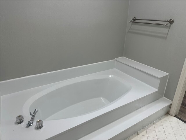 1112 Ranger Ct, Plano, TX 75075 - bathroom featuring a garden tub and tile patterned flooring