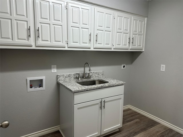 1112 Ranger Ct, Plano, TX 75075 - laundry area with cabinet space, washer hookup, dark wood finished floors, and electric dryer hookup