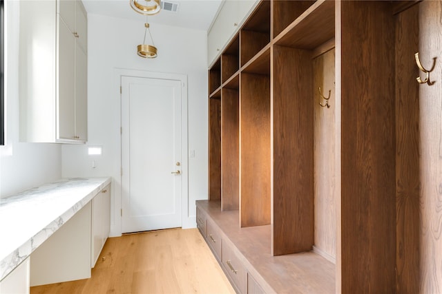 7226 Colgate Ave, Dallas, TX 75225 - mudroom with light wood-type flooring