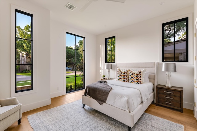7226 Colgate Ave, Dallas, TX 75225 - bedroom with light wood-style flooring and baseboards