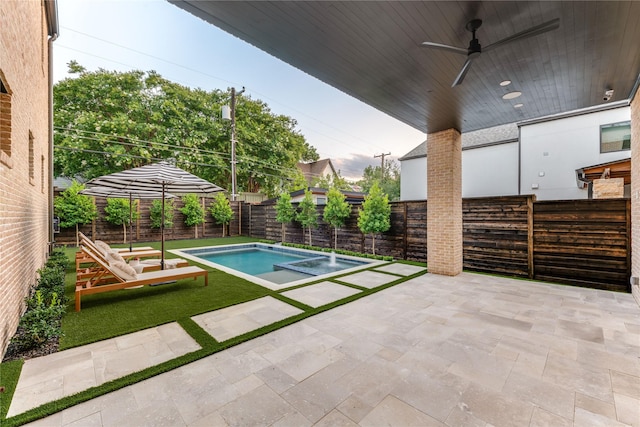 7226 Colgate Ave, Dallas, TX 75225 - view of swimming pool featuring a fenced backyard, a patio area, ceiling fan, and a pool with connected hot tub