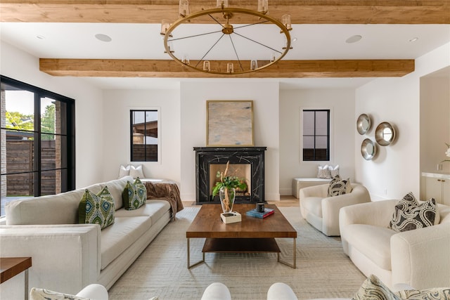 7226 Colgate Ave, Dallas, TX 75225 - living room featuring beamed ceiling, light wood-style floors, a high end fireplace, and recessed lighting