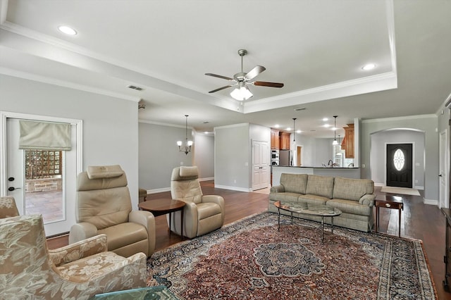 6460 Cherry Hills Dr, Frisco, TX 75036 - living area with wood finished floors, ceiling fan, arched walkways, a raised ceiling, and crown molding