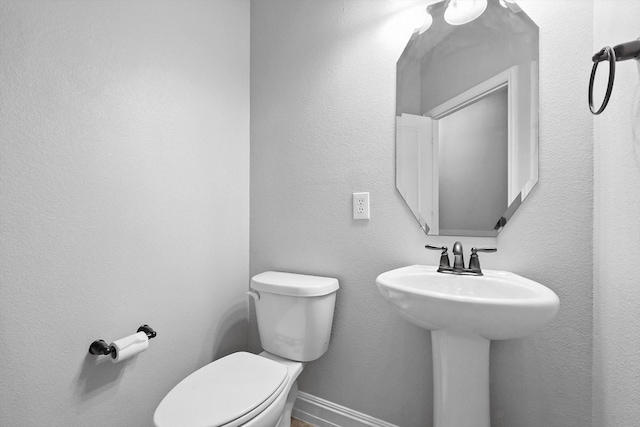 6460 Cherry Hills Dr, Frisco, TX 75036 - half bathroom with toilet and a sink