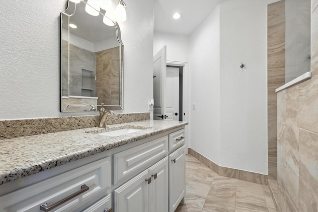 6460 Cherry Hills Dr, Frisco, TX 75036 - full bath with vanity, marble finish floors, walk in shower, and recessed lighting