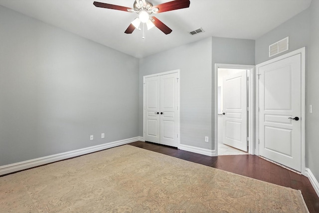 6460 Cherry Hills Dr, Frisco, TX 75036 - unfurnished bedroom featuring dark wood-style floors, a closet, a ceiling fan, and ensuite bathroom
