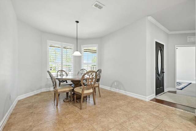 6460 Cherry Hills Dr, Frisco, TX 75036 - dining area with ornamental molding and light tile patterned floors