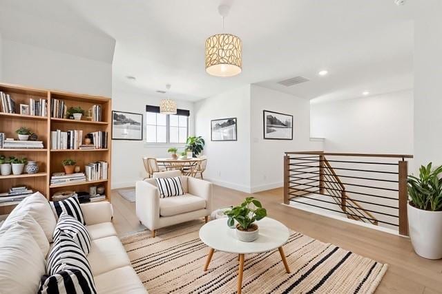 4541 Walnut Grove Ln, Prosper, TX 75078 - living area featuring light wood-type flooring and recessed lighting