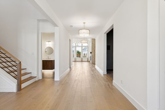 4541 Walnut Grove Ln, Prosper, TX 75078 - entryway featuring light wood finished floors and stairs