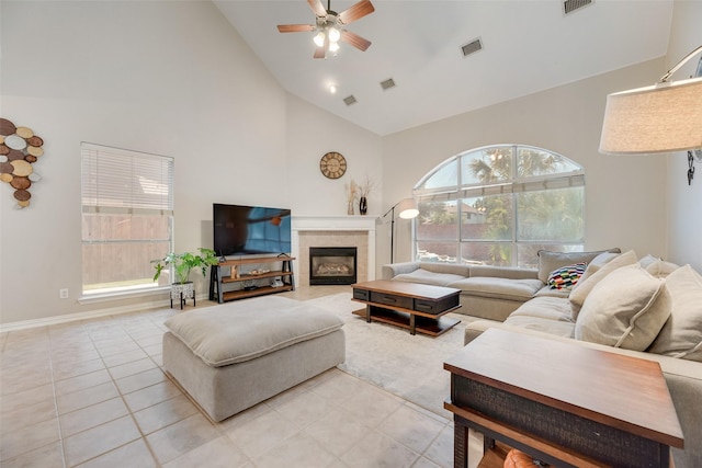 2621 Princeton Dr, Flower Mound, TX 75022 - living room featuring high vaulted ceiling, a ceiling fan, light tile patterned floors, and a fireplace