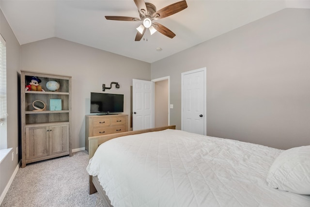 2621 Princeton Dr, Flower Mound, TX 75022 - bedroom with vaulted ceiling, light colored carpet, and a ceiling fan