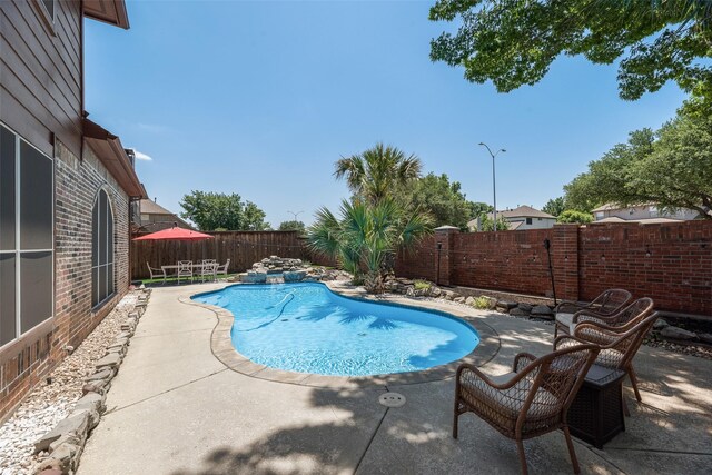 2621 Princeton Dr, Flower Mound, TX 75022 - view of pool featuring a patio and a fenced backyard