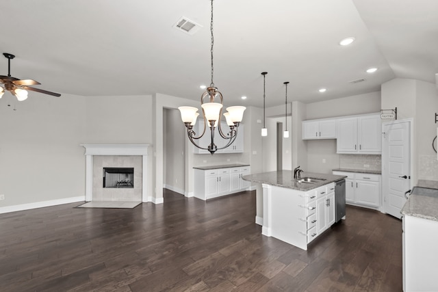 6001 Harwich Ln, Fort Worth, TX 76179 - kitchen featuring open floor plan, a ceiling fan, dark wood-style flooring, stainless steel dishwasher, and recessed lighting