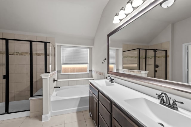 6001 Harwich Ln, Fort Worth, TX 76179 - full bathroom with lofted ceiling, tile patterned floors, a bath, a stall shower, and double vanity