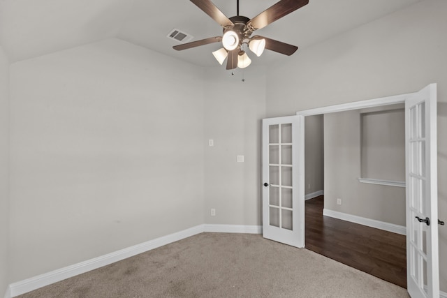 6001 Harwich Ln, Fort Worth, TX 76179 - unfurnished bedroom with french doors, vaulted ceiling, carpet flooring, and a ceiling fan