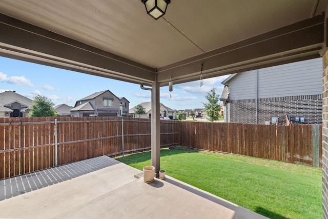 6001 Harwich Ln, Fort Worth, TX 76179 - fenced backyard featuring a residential view and a patio