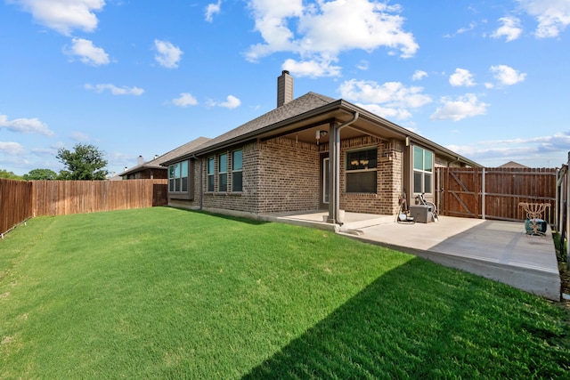 6001 Harwich Ln, Fort Worth, TX 76179 - rear view of property featuring a patio area, a chimney, a fenced backyard, and brick siding