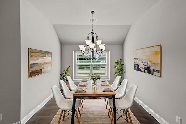 6001 Harwich Ln, Fort Worth, TX 76179 - dining space featuring dark wood-type flooring, lofted ceiling, and a chandelier