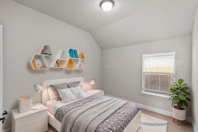 6001 Harwich Ln, Fort Worth, TX 76179 - carpeted bedroom with lofted ceiling and baseboards