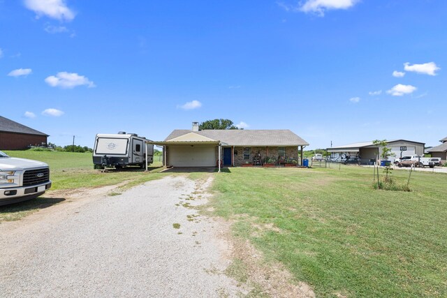 9395 Green Springs Cir, Sanger, TX 76266 - view of front of home featuring gravel driveway and a chimney