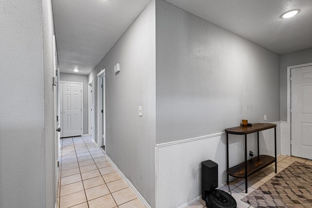 9395 Green Springs Cir, Sanger, TX 76266 - hall with light tile patterned floors