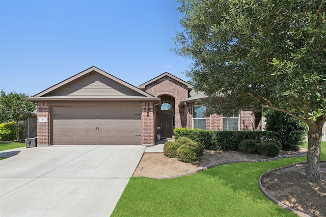 100 Tall Meadow St, Azle, TX 76020 - view of front facade featuring brick siding, an attached garage, driveway, and a front lawn
