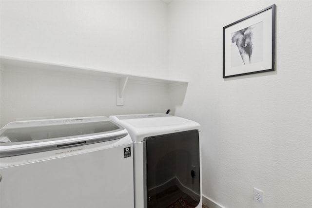 100 Tall Meadow St, Azle, TX 76020 - laundry room featuring washing machine and dryer
