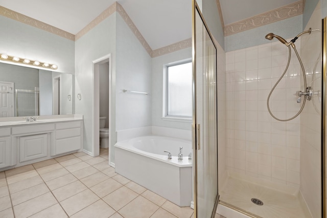 6700 Crane Rd, North Richland Hills, TX 76182 - bathroom featuring a stall shower, a bath, vanity, and tile patterned floors
