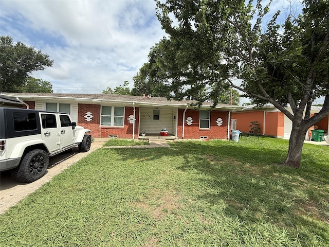 1421 Richard St, Mesquite, TX 75149 - ranch-style home featuring brick siding, a front yard, and covered porch