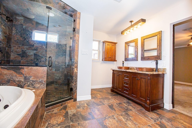 550 Briarwood Dr, Southlake, TX 76092 - full bathroom featuring healthy amount of natural light, a shower stall, a jetted tub, and double vanity