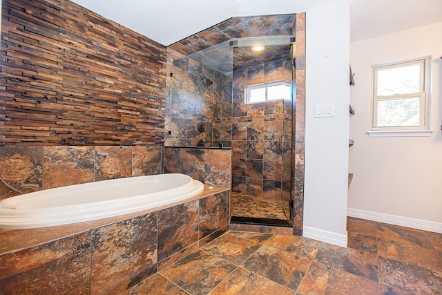 550 Briarwood Dr, Southlake, TX 76092 - bathroom with a garden tub, a stall shower, healthy amount of natural light, and stone tile flooring