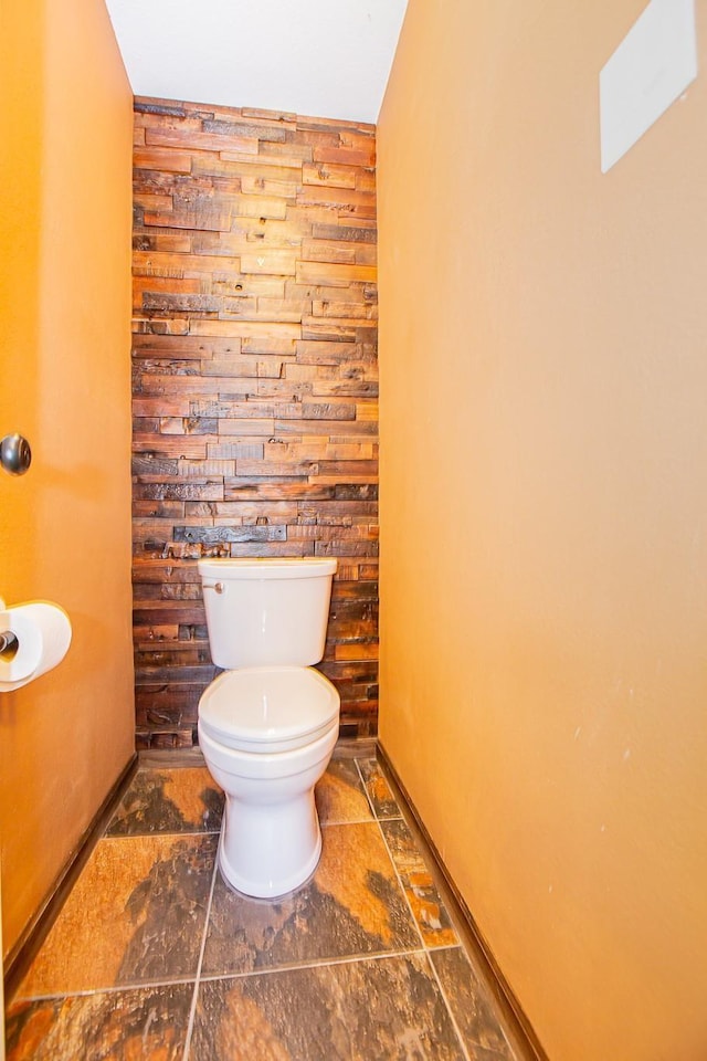 550 Briarwood Dr, Southlake, TX 76092 - bathroom featuring toilet and stone finish flooring